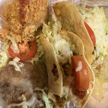 El Senor Frog's signature dishes Chicken Taco and Chile Relleno Dinner PlateSteak and Shrimp Dinner Bomb ComTacos